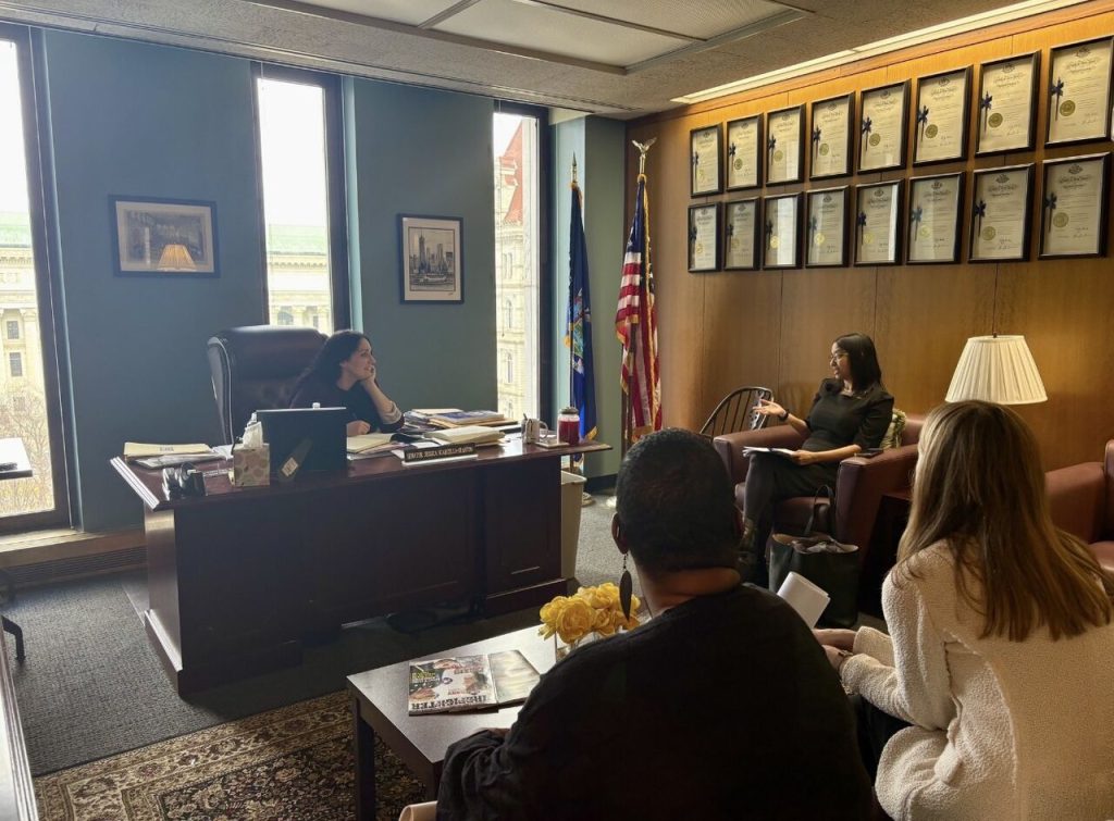 Archana chats with Senator Jessica Scarcella-Spanton in the Senator's office at the state Capitol.